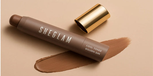 SHEGLAM Golden Sun cool-toned liquid contour stick with gold cap, shown on a beige background with a smooth brown swatch beside the product.