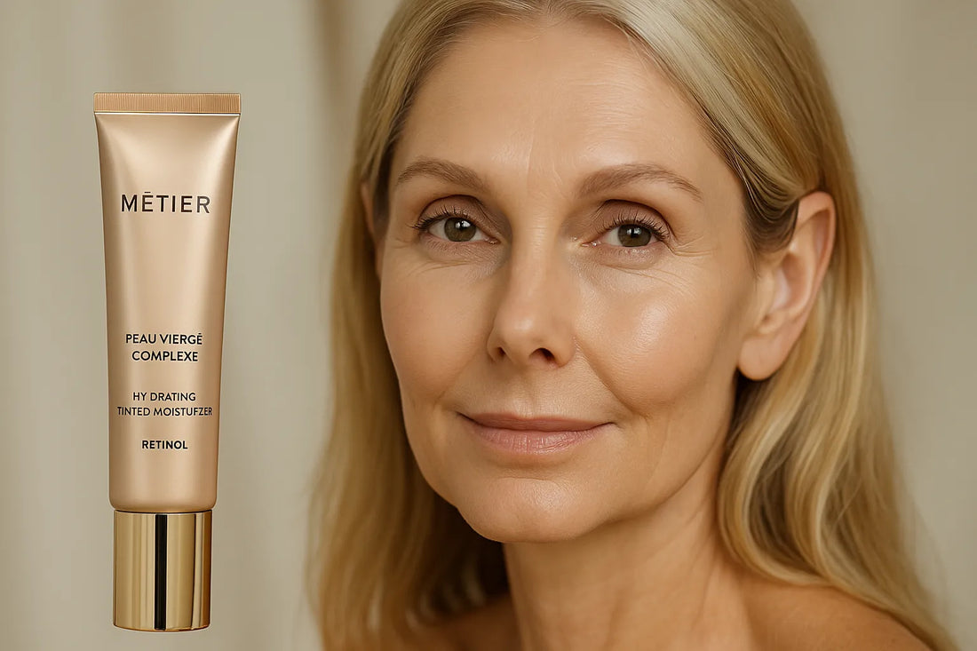 A middle-aged woman with glowing skin next to a MĒTIER Peau Vierge Complexe retinol moisturizer, showcasing natural radiance and elegance.